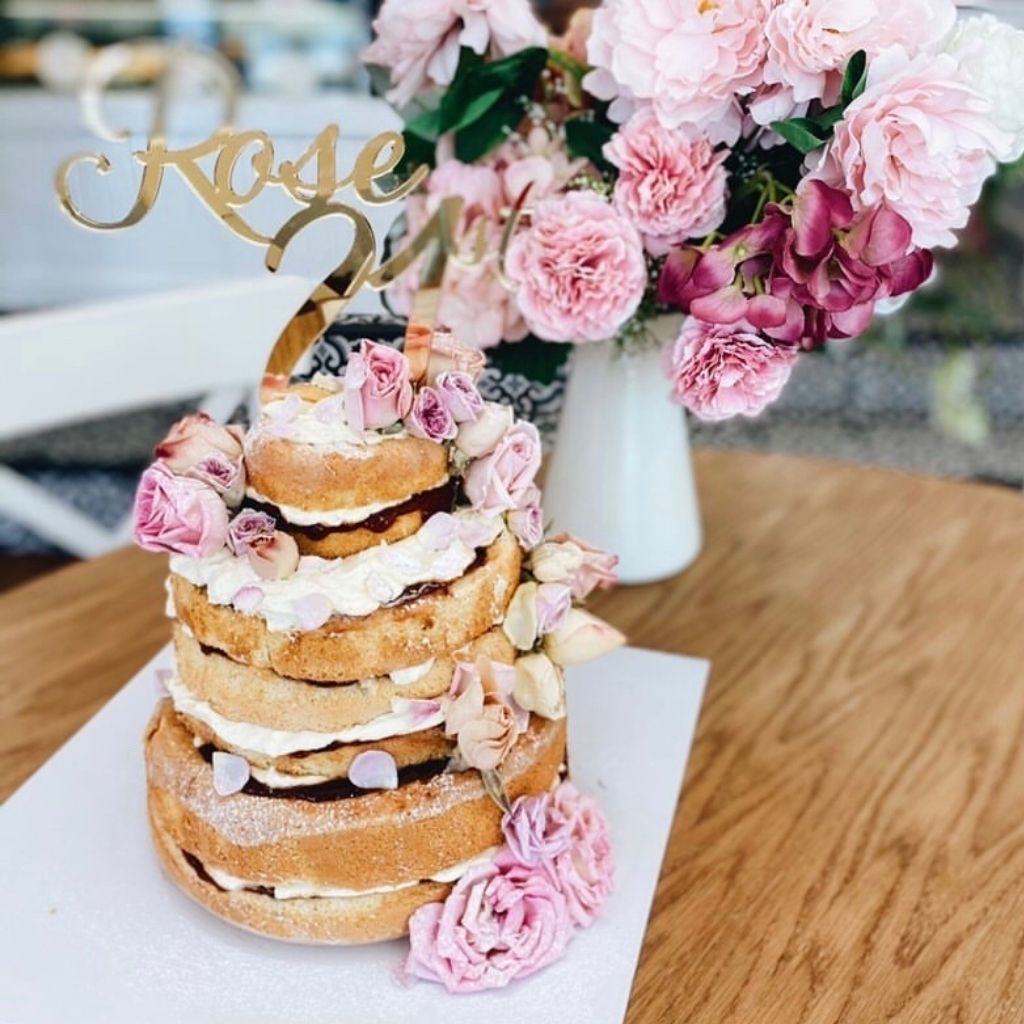 Floral cake decorated with freeze dried edible flowers from Bloomish.