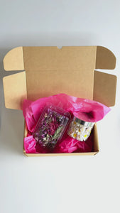 Video of 2 packets of freeze dried edible flowers in pastel colours.